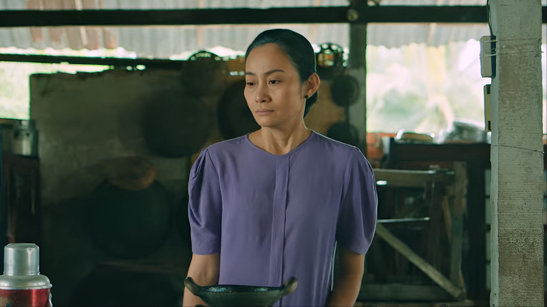 Hanh Thuy as Mrs. Ha, a mother grappling with grief and family expectations in The Ancestral Home. (Image via Skyline Media)